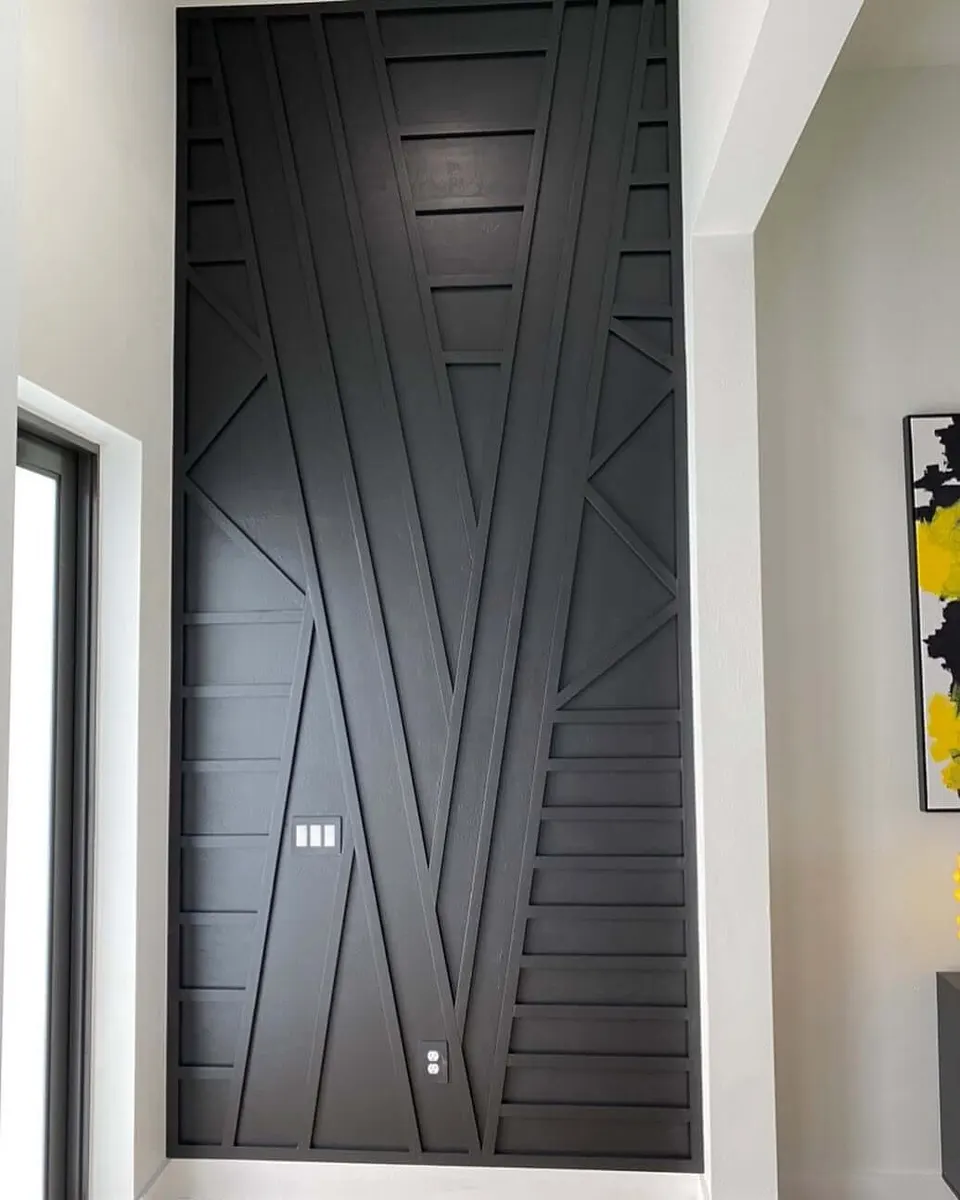Black geometric slat accent wall